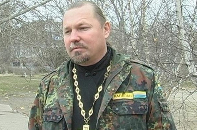 Поліція Херсона звинуватила капелана УПЦ КП в торгівлі зброєю