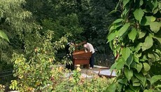 In Lavra, reserve staff carrying out manipulations with saints' relics 