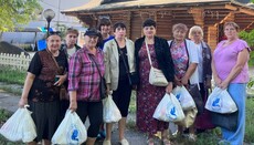 Соцвідділ УПЦ у Києві передав допомогу 100 сім'ям переселенців