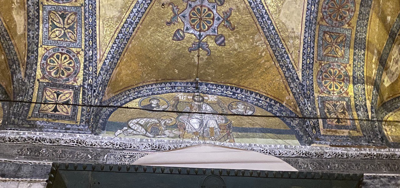 Christian mosaic in Hagia Sophia, which is covered with curtains during prayer.
